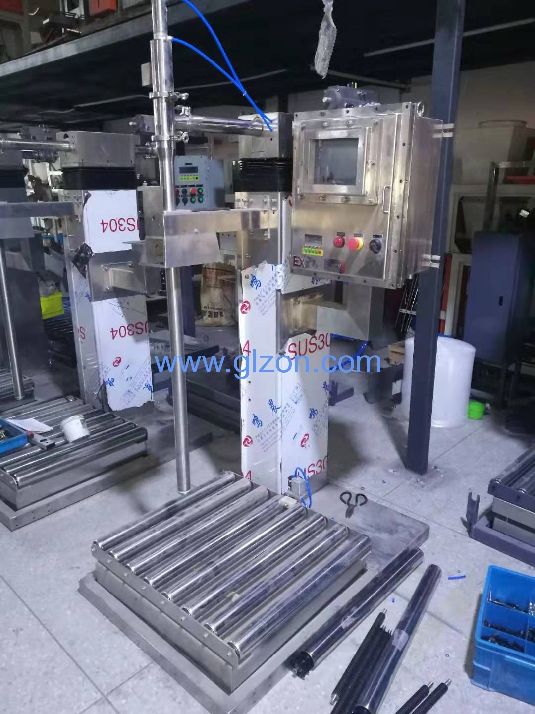 1572147046437716.jpg 液體灌裝機,稱重灌裝機,定量灌裝機